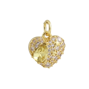 Vue détaillée d'un pendentif cœur avec pierre jaune et accents d'étoiles dorées