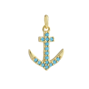 Macro detail of a 18k gold-plated anchor pendant with turquoise blue bead inlays