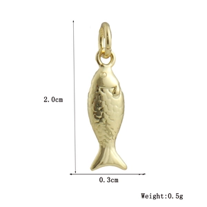 Detail of 18k gold plated fish charm showing 2.0cm length and intricate scale texture