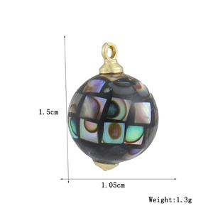 Ball pendant with abalone shell mosaic including measurements 1.5cm by 1.05cm