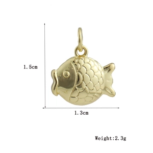 Detail of fish pendant showing 1.5cm height and engraved scales in 18k gold finish