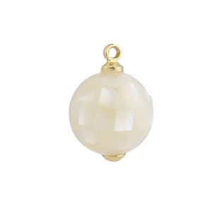 Macro detail of geometric sphere pendant with white mother of pearl inlay and 18k gold plating