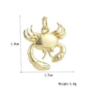 Détails des dimensions d'un pendentif crabe plaqué or 18 carats mesurant 1,8cm par 1,7cm