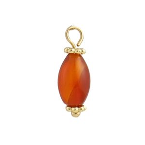 Macro detail of teardrop carnelian stone pendant with 18k gold plated granular caps