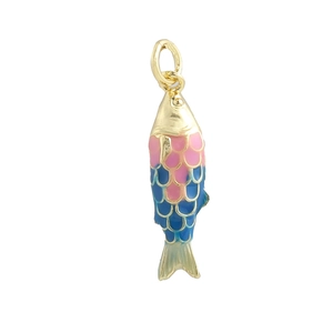 Close-up of a 18k gold-plated fish pendant with pink and blue enamel scales