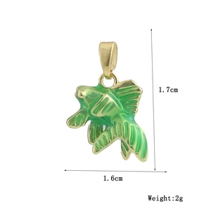 Detail showing dimensions of fish pendant with green enamel and 18k gold plating