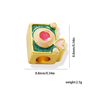 Detail of 18k gold plated geometric stone charm with green enamel and size measurement