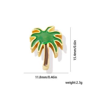 Detailed size view of a 15.4mm gold palm tree pendant with green enamel finish
