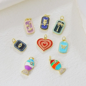 Detailed view of 18k gold plated colorful enamel charms for bracelets and necklaces