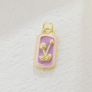 18k gold plated castle pendant with lavender enamel and dandelion relief floral design