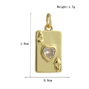 Macro shot of gold Ace of Hearts pendant with size markings and weight of 1.7g