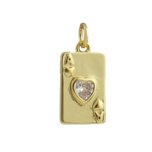 Macro shot of gold poker Ace of Hearts pendant with a sparkling heart zircon stone