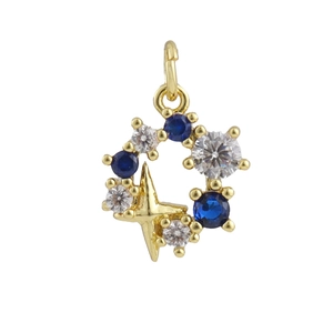 Detailed view of a gold flower wreath star pendant with blue and clear zircon stones