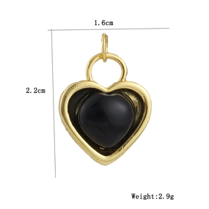 Detailed view of 18k gold plated heart pendant with black enamel finish and measurements