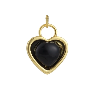 Macro view of gold 18k plated heart pendant with black inlay for custom jewelry