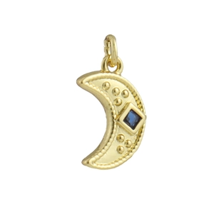 Detailed view of a gold-plated crescent moon pendant with a square blue stone inlay