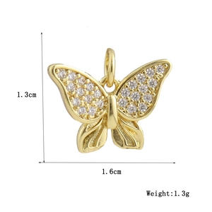Macro detail of butterfly pendant with 1.3cm height, 1.6cm width and 1.3g weight