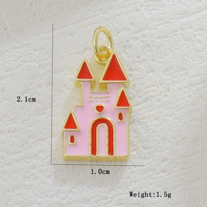 Detailed view of a pink castle pendant with 18k gold plating and size measurements