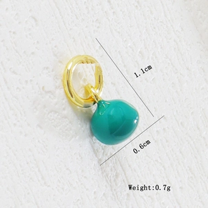 Detail view of 1.1x0.6cm green teardrop charm with golden ring for DIY jewelry making