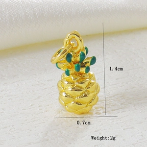 Detail of 1.4cm gold pineapple charm with green enamel coating for DIY jewelry