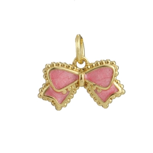 Detailed view of gold bow pendant with pink marble texture for DIY jewelry making