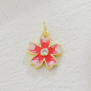 Delicate gold-plated cherry blossom pendant with pink enamel and sparkling zircon stone