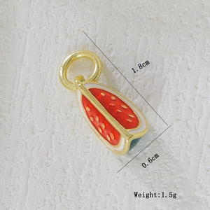 Detailed size view of watermelon pendant with gold plating, measuring 1.8cm by 0.6cm
