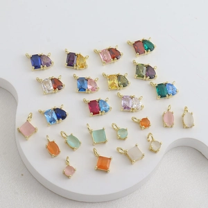 Detailed collection of 18k gold plated charms with colorful zircon in various shapes