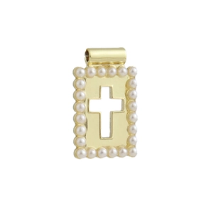 Macro view of a 18k gold-plated rectangular pendant featuring a cross and pearl border