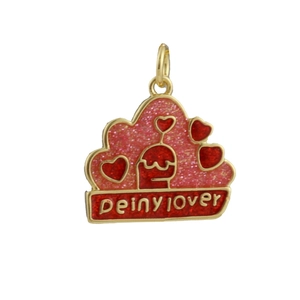 Detailed macro view of heart enamel pendant with pink glitter and gold plating