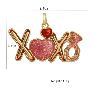 Detailed size chart of gold XOXO charm with pink and red glitter heart pendants