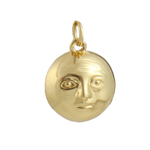 Detailed macro view of a round 18k gold plated sun face relief pendant jewelry