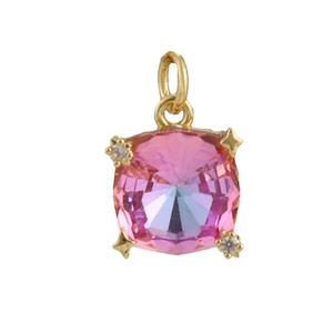 Macro view of cushion-cut pink gemstone pendant with gold star-shaped settings and diamonds