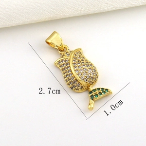 Macro view of 18k gold plated rose pendant with micro-pave white and green zircons