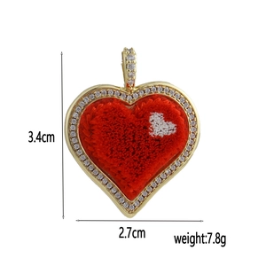 Detail of 18k gold plated red heart pendant with white zircon border and dimensions