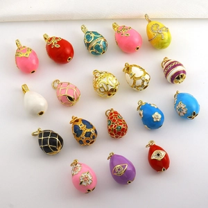 Collection of colorful Faberge-style egg pendants with 18k gold plating and enamel details