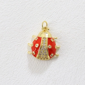 18k gold plated ladybug pendant with red enamel and white cubic zirconia accents