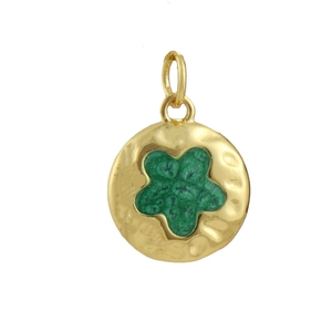 Detail of 18k gold plated round pendant with hammered texture and green flower inlay