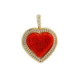 Detail of red heart pendant with 18k gold plating and shimmering pavé zirconia accents