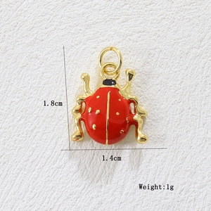 Detailed size view of red ladybug pendant with 1.8cm height and 1.4cm width dimensions