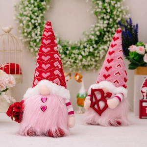 Pair of Valentine's day gnomes with glowing lights and red roses in a romantic setting