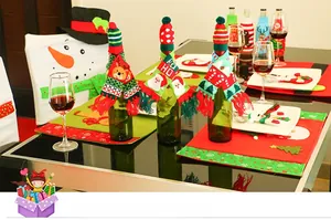 Detail of Christmas knitted hat and scarf set for wine bottles with festive patterns