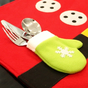 Christmas green glove cutlery holder with white snowflake and plush trim for table decor