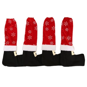Set of 4 Christmas chair leg covers in Santa boots design with snowflake patterns