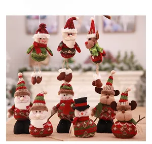 Detail of Christmas plush ornaments featuring santa snowman and reindeer with knit texture
