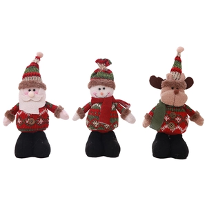 Three plush Christmas figurines including Santa, Snowman and Reindeer with knit textures