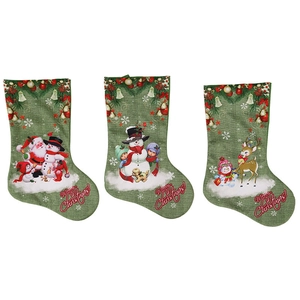 Three-piece set of green vintage Christmas stockings with pine, berries and bells decor