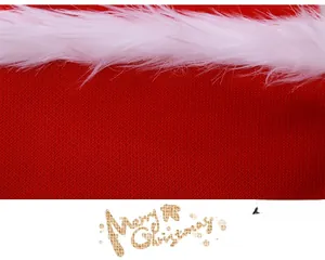 Macro detail of red knitted Christmas hat featuring plush white faux fur lining and texture