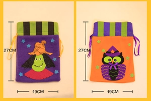 Detail of Halloween drawstring gift bags in purple witch and orange owl felt designs