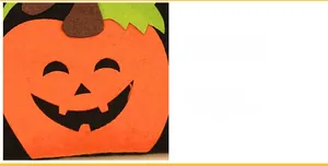 Detail of felt Halloween pumpkin bag featuring orange cutout face and green vine accent